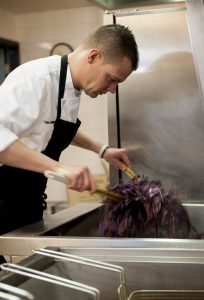 Chef working in a school kitchen