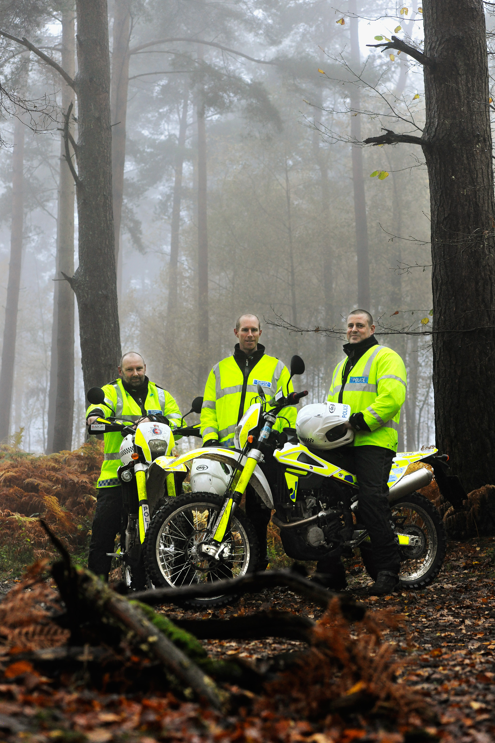 Policemen on motocross bikes patrolling byways