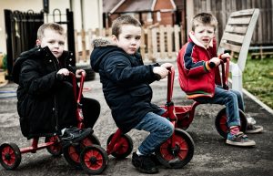 Boys on trikes