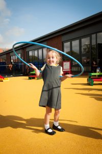 Hoola hooping school girl