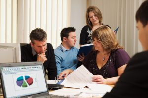 Book keepers at work in an office