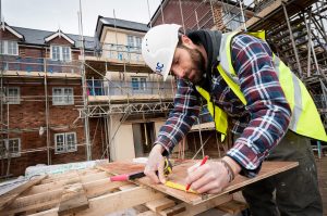 Carpenter workin on a building site