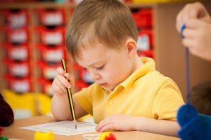 Child in school classroom