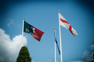 Flags Flying at Wentworth against a blue sky