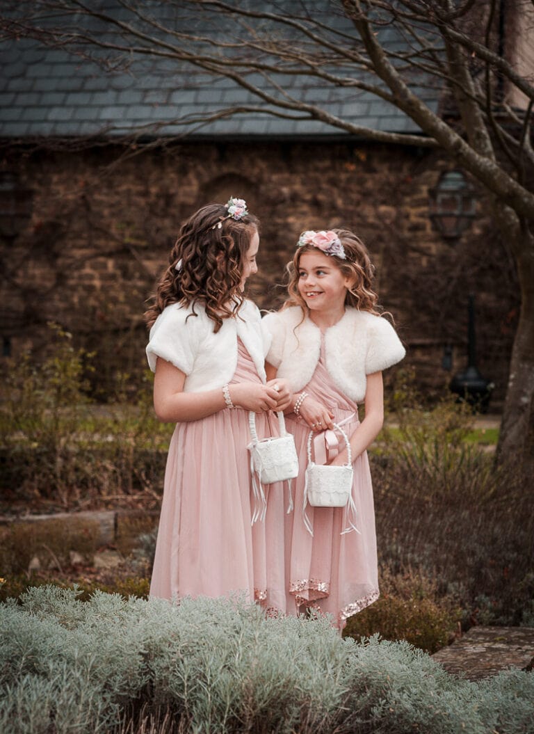 2 bridesmaids in a wintery garden