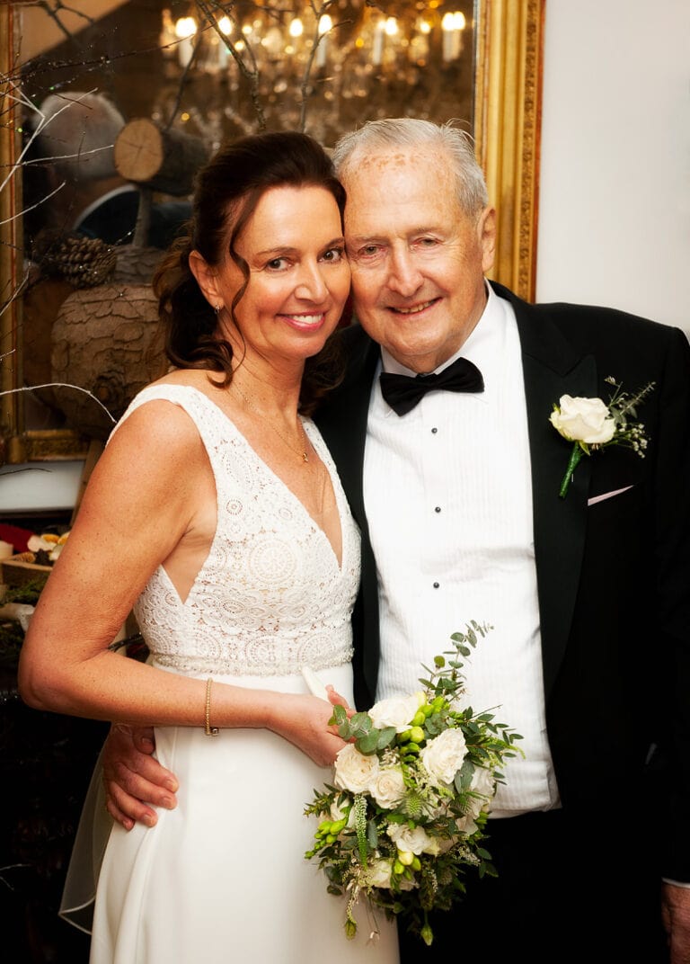 Bride and groom inside a cosy hotel