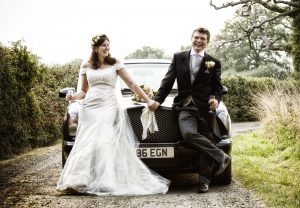 Bride and groom wedding car