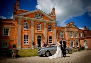 Bride and Father arriving at Warbrook House, Classic Wedding Car