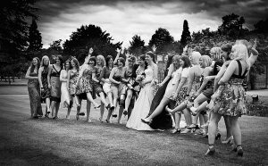 Fun wedding group shot of girls, jones and co photography at Warbrook House