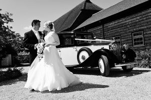 Arriving at Gate Steeet in vintage wedding car