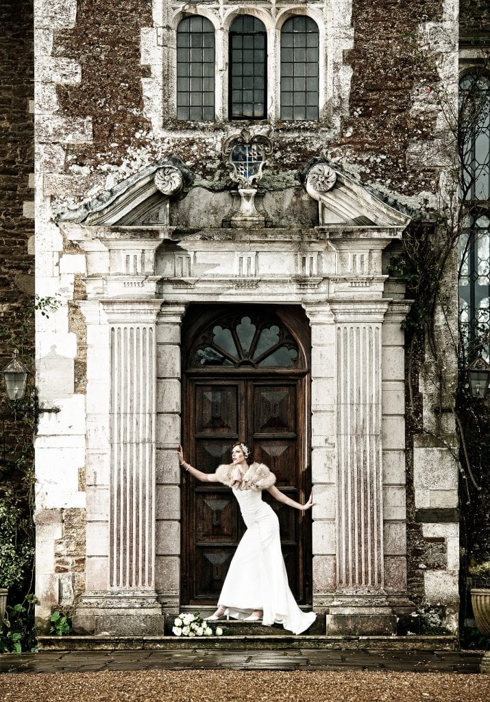 1920s Great Gatsby Styled Wedding Shoot Bride in Doorway