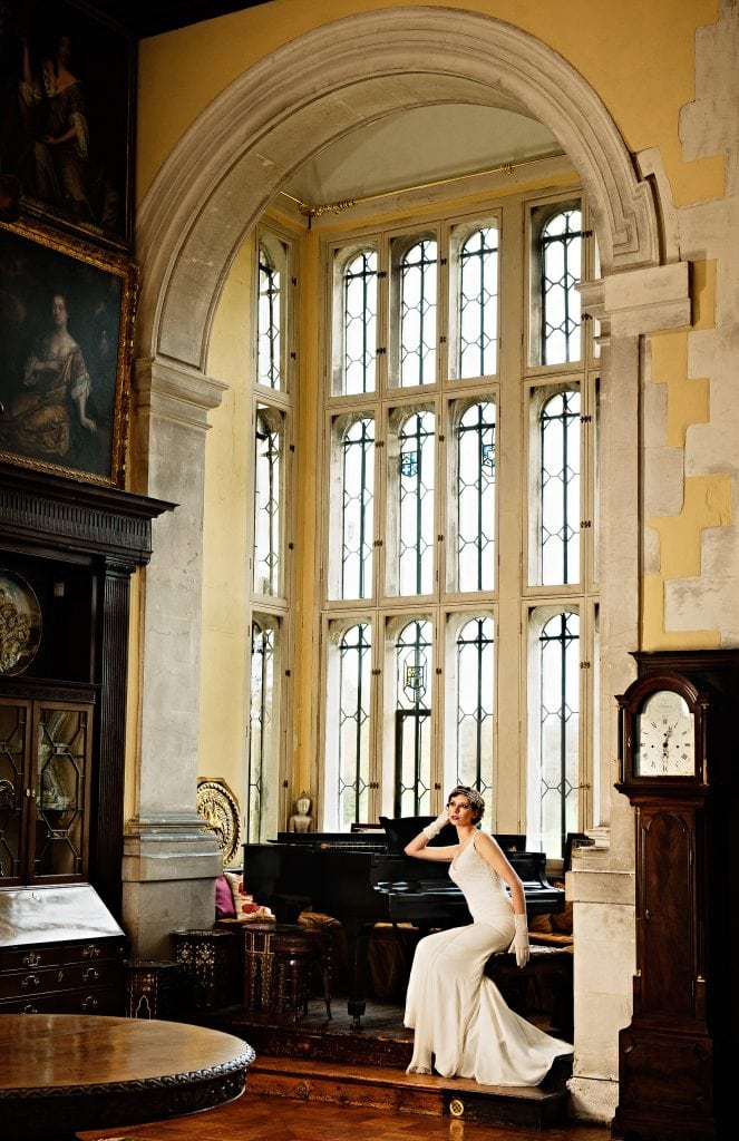 Great Gatsby Inspired shoot Bride posing by Piano