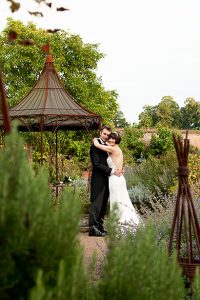 Bride and groom in the Walled Garden at Cowdray