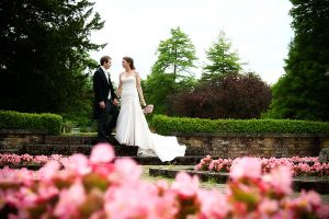 The Bride and Groom in the formal garden, Warbrook House, Hampshire wedding photographer