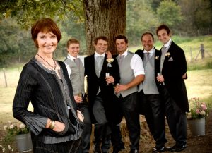 Mother and her sons at a country wedding