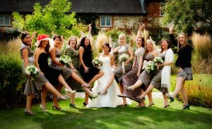 Girls having fun at a wedding at Bury Court