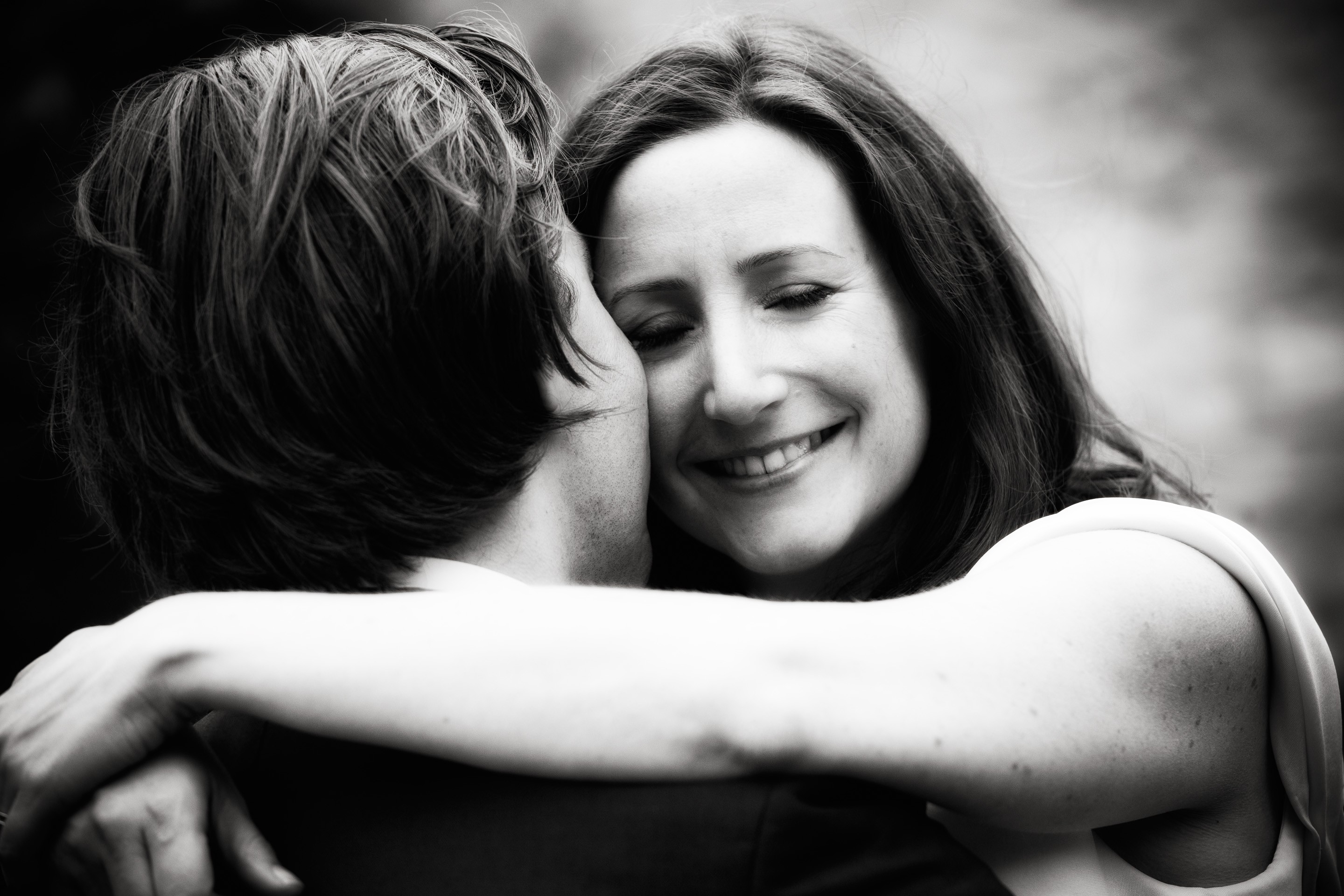 Couple hugging at The Great Barn in Tetbury