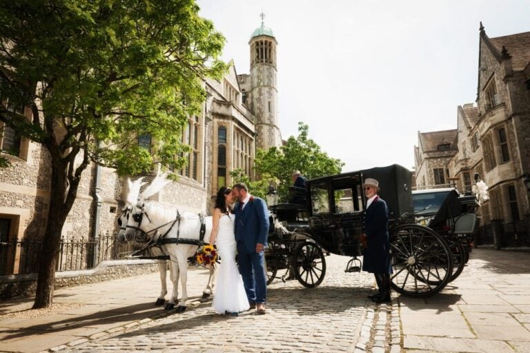 Bride and groom with a horse and carriage