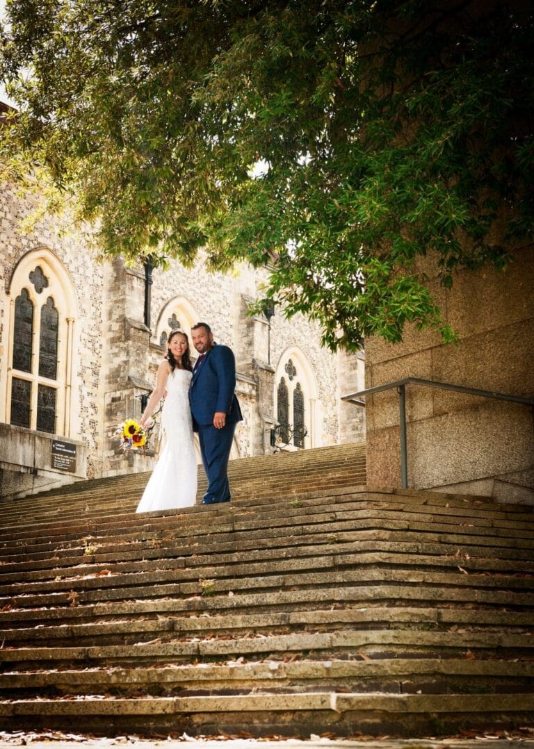 Bride and groom on steps