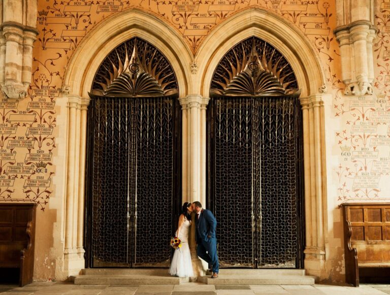 Bride and groom in a grand hall