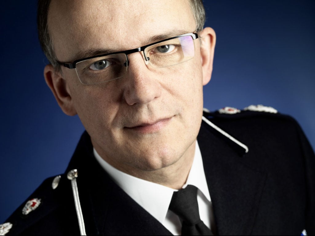 Surrey Police Officer close up studio portrait